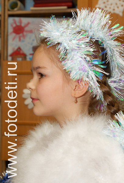 Фотогалерея детских праздников. Девочка в костюме снежинки.