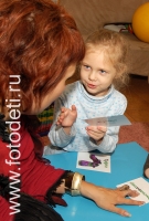 Обучение детей чтению, снимок из архива детского фотографа