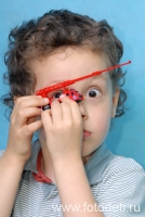 Присутствие игрушки в детском портрете, фотография детского фотографа Игоря Губарева