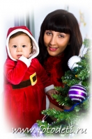 Мама маленького Санта Клауса в исполнении младенца. Детский и семейный фотограф.